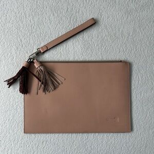 100% leather clutch
